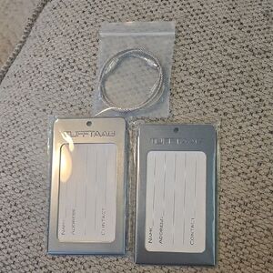 NWT TUFFTAAG Silver Luggage Tags Pair